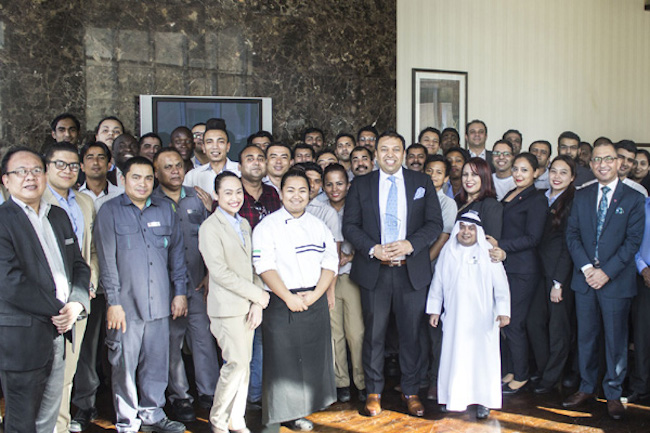 General manager Shahzad Butt and staff from Ramada Downtown Dubai celebrate the award