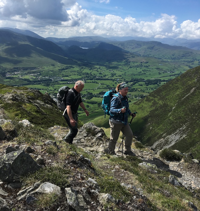 Hikers enjoy the view from Blencathra in the Lake District