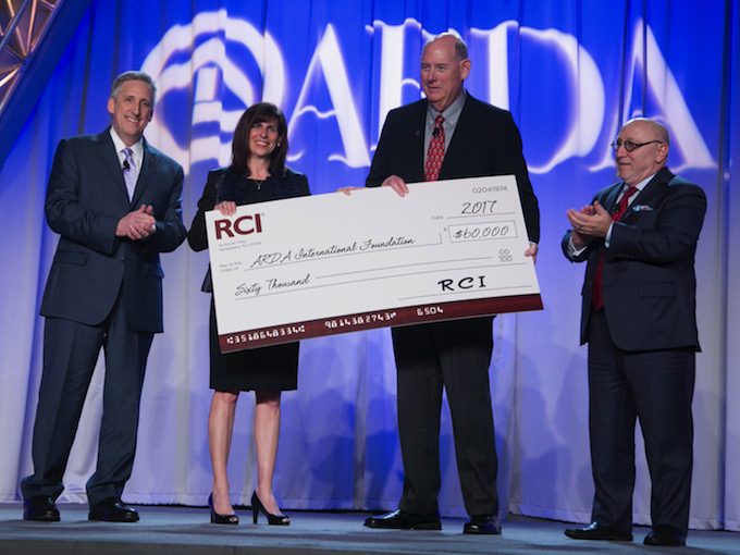 At the cheque presentation, from left: Gordon Gurnik, president of RCI; Gail Mandel, CEO of RCI; Robert Miller, AIF chairman; and Howard Nusbaum, ARDA president and CEO