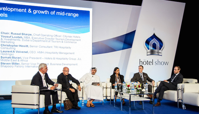 Laurent A. Voivenel (second from right) takes part in a panel discussion on the booming mid-market in Dubai